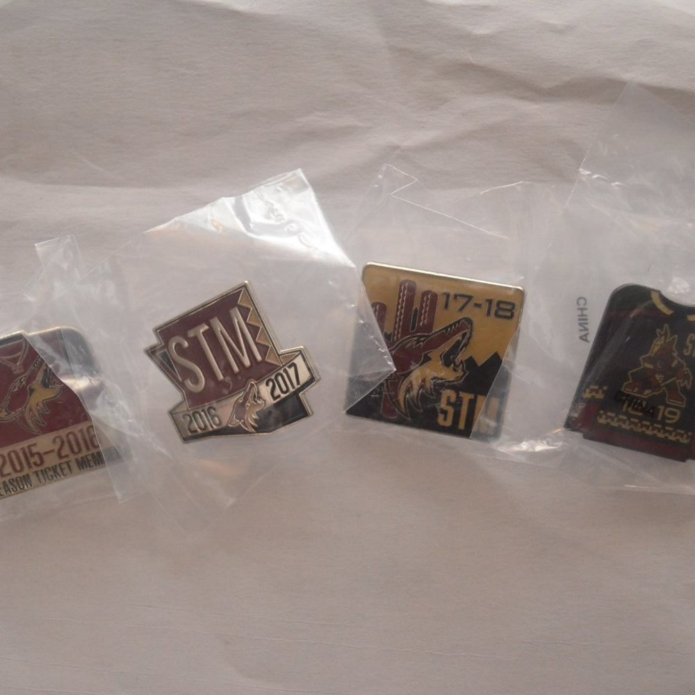 Lot of (4) Arizona Coyotes Season Ticket Member (STM) Pins